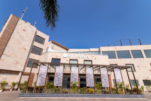 a building with flags in front of it at VIVANA in Dhanbād