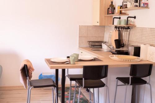 Η κουζίνα ή μικρή κουζίνα στο Apartman Casa Skerlak