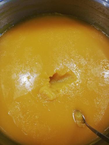 a pot full of soup with a spoon in it at B&B Relais sul Siroto in Castelnuovo Cilento