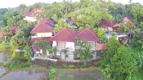 an aerial view of a house in a village at The Gecho Inn Country in Jepara