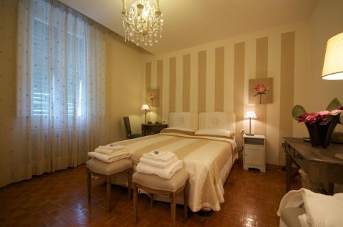 Katil atau katil-katil dalam bilik di Terrazza Ginori