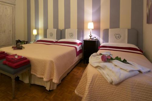 Cama o camas de una habitación en Terrazza Ginori