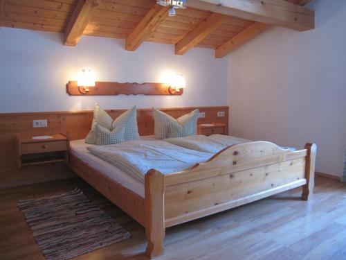 Ліжко або ліжка в номері Hausernhof
