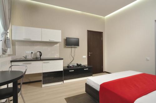 Cama o camas de una habitación en DayFlat Apartments on Mykhailivs'ka