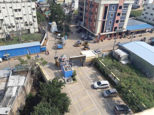 an aerial view of a parking lot in a city at Devansh Bhanu Residency DBR in Srikalahasti