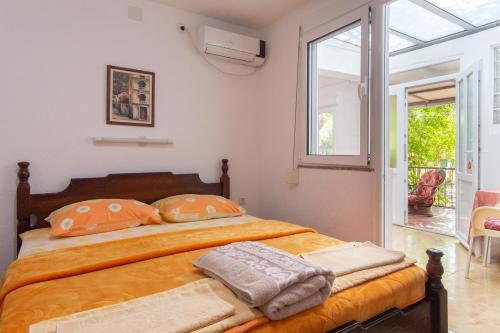 מיטה או מיטות בחדר ב-Apartments Oliva
