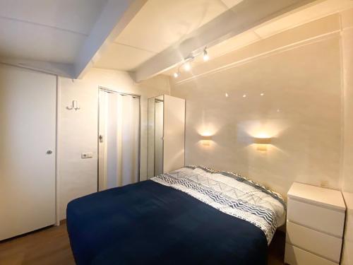 Postel nebo postele na pokoji v ubytování Vakantiewoning dichtbij Centrum Domburg DO13
