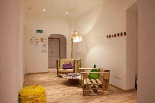 a room with a room with wooden furniture in a room at Albergo delle Spezie in La Spezia