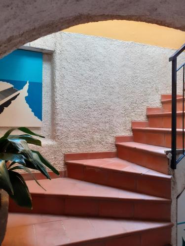 a set of stairs leading up to a building at Il Patio in Manarola