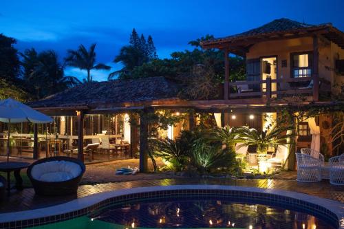 Bazén v ubytování Espelho das Águas Búzios nebo v jeho okolí