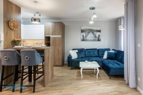 Posezení v ubytování Apartamenty BlueSky - Nad Łomnicą 2B - blisko centrum Karpacza i sklepów, w spokojnej, zielonej okolicy