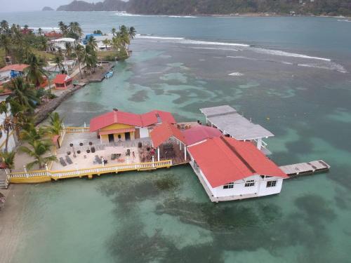 an aerial view of a resort in the water at Hotel Cocotal in Isla Grande