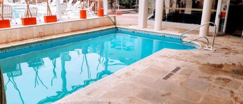 The swimming pool at or close to San Remo Resort Hotel