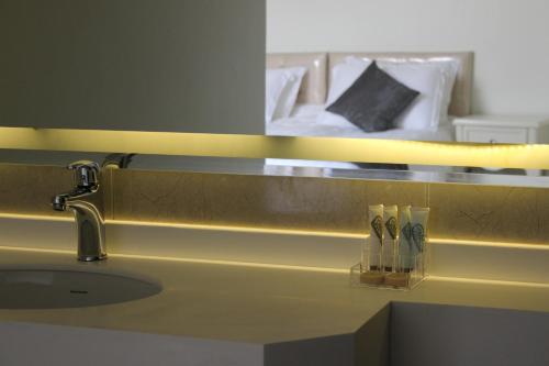 En eller flere senge i et værelse på بيت السليمي التراثي