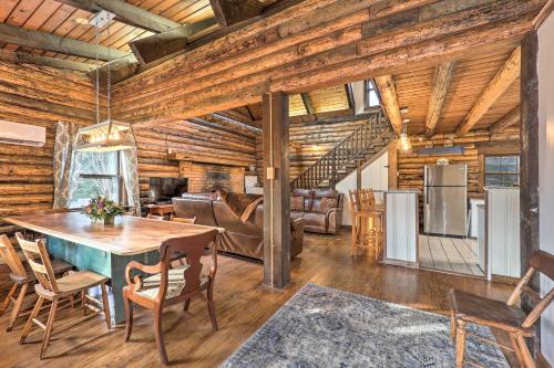 a kitchen and living room with a table and chairs at Relaxing Retreat with Private Dock on Claytor Lake! in Dublin