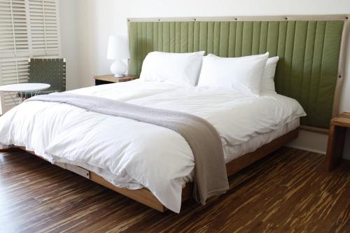 Postel nebo postele na pokoji v ubytování H2hotel