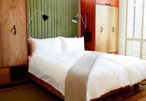 Postel nebo postele na pokoji v ubytování H2hotel