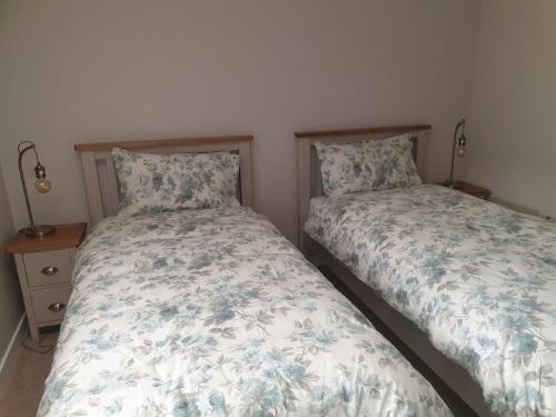 Postel nebo postele na pokoji v ubytování Congesquoy Barn