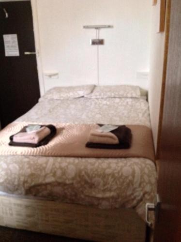Postel nebo postele na pokoji v ubytování Oban House