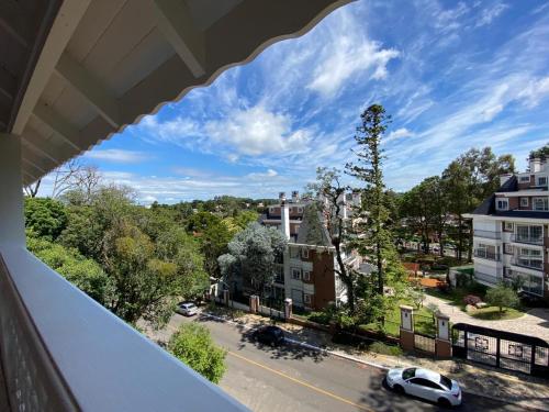 a view of a city street from a balcony at Lapônia Hotel Gramado in Gramado