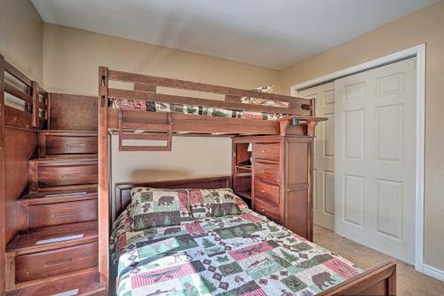 a bedroom with a bunk bed and a closet at Hilltop Haven in Florissant Deck and Mountain View! in Florissant