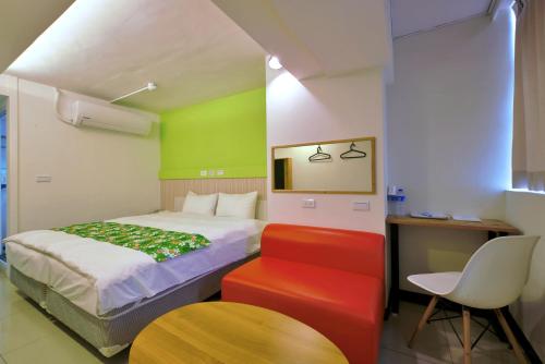 Tempat tidur dalam kamar di Good Night Hotel