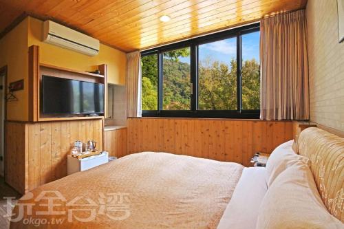 Sun Moon Lake Tan Hsiang Yu B&B 객실 침대