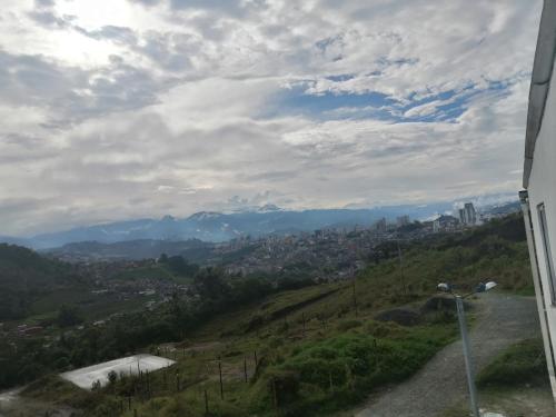 a view of a city from a hill at Apartamento-Habitación Palonegro Manizales in Manizales