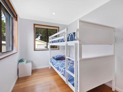 Ένα ή περισσότερα κρεβάτια σε δωμάτιο στο Blue Summer House