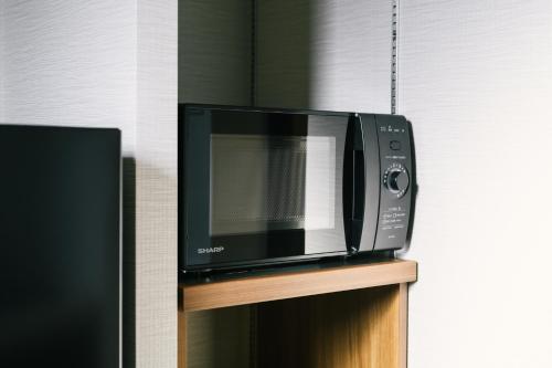 Hotel Iori ホテル庵にあるキッチンまたは簡易キッチン