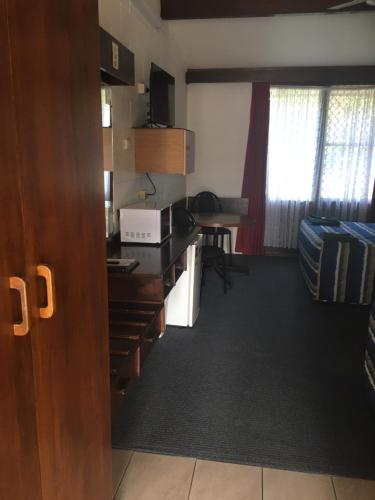 Kuchyň nebo kuchyňský kout v ubytování Peppercorn motor inn
