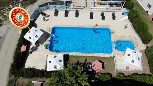 an overhead view of a swimming pool in a resort at Club de Vacanta Corabia Piratilor - Family Resort Mamaia Nord in Mamaia Nord