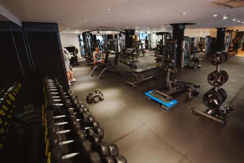 an overhead view of a gym with weights at Mihrako Hotel & Spa in As Sulaymānīyah