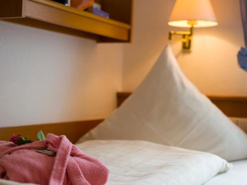 Letto o letti in una camera di Haus Hildegard