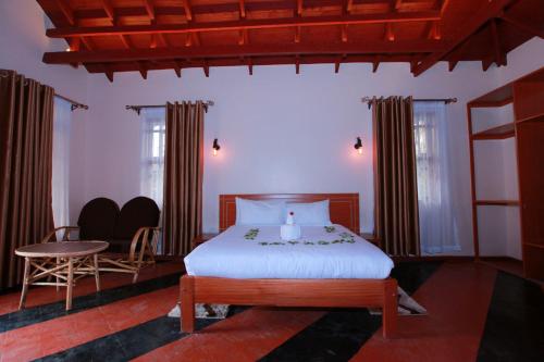 Postel nebo postele na pokoji v ubytování Mtoni Resort, Naro moru