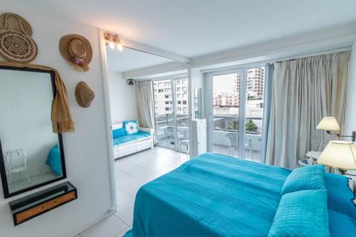 Postel nebo postele na pokoji v ubytování Apto cómodo y funcional, en la mejor ubicación! Puerto y playas a pie.