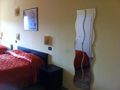 Postel nebo postele na pokoji v ubytování Albergo Carpino