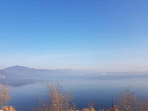 a view of a large body of water at Sielanówek - Orzechowa Chatka z sauną wanną termalną jacuzzi in Żywiec