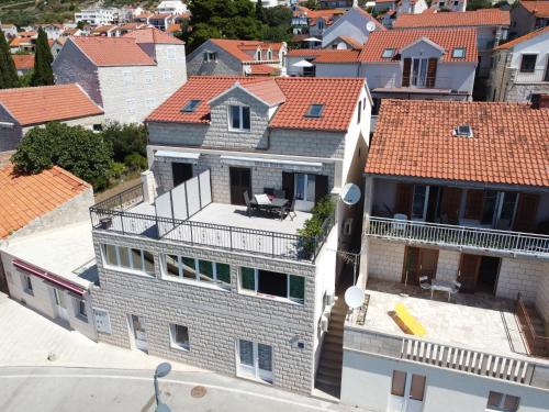 an aerial view of a house with red roofs at House Racic in Bol