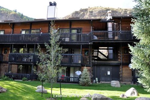 an exterior view of a building with a yard at Interlochen #B9 in Vail