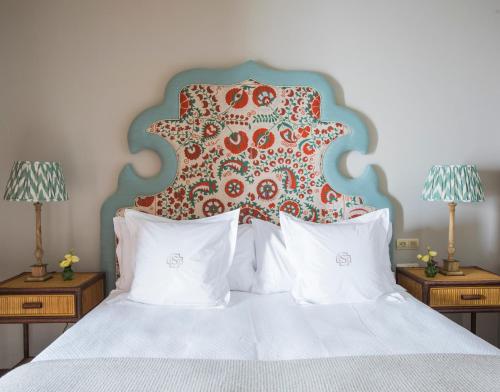 A bed or beds in a room at La Sacristía