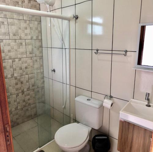 Ένα μπάνιο στο Residencial Sandini Garopaba