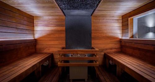 a inside of a sauna with a stove in it at LaSpa in Laulasmaa