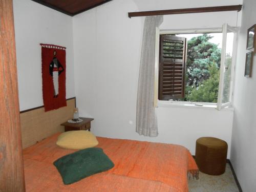 Cama o camas de una habitación en Holiday Home Luznar