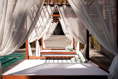 Postel nebo postele na pokoji v ubytování Brique Hotel Chiangmai