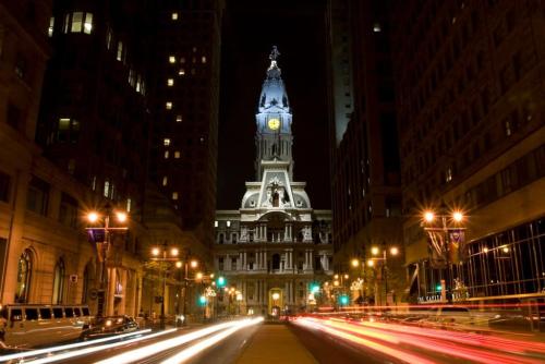 a building with a clock tower in the middle of a street at 915CountyLineRoad Luxury Mainline Train Colleges in Bryn Mawr