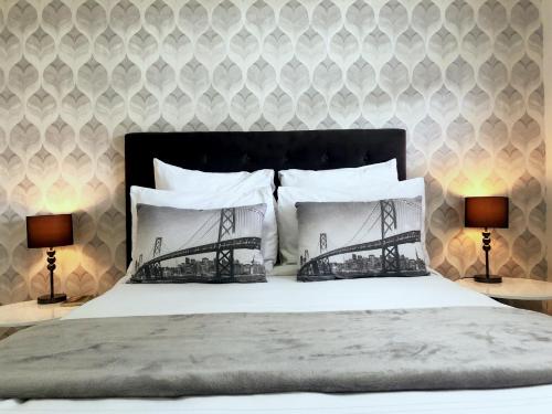 a bedroom with a bed with a bridge pillow at Mikey's place with Fibre Uncapped WiFi in Midrand