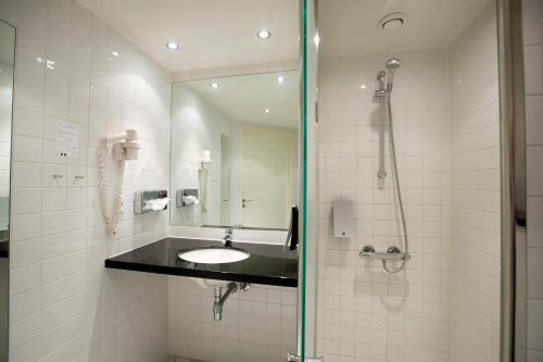 Koupelna v ubytování Hotel Hedegaarden