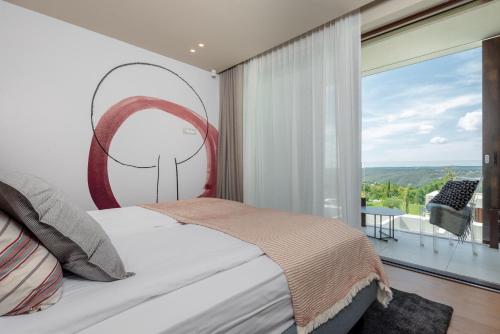 Posteľ alebo postele v izbe v ubytovaní Villa Adoral