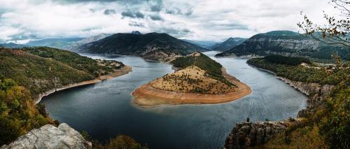 an aerial view of a river in the mountains at Stylish loft studio with great view to Ardino in Ardino